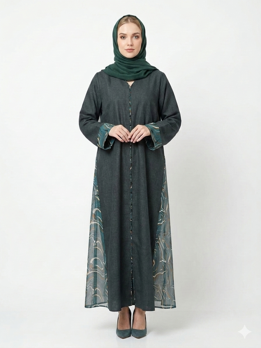 Fair-skinned model with grey eyes wearing the Rizqé Sage Fusion green cotton abaya with sheer chiffon side panels and matching green hijab against a solid white studio background.